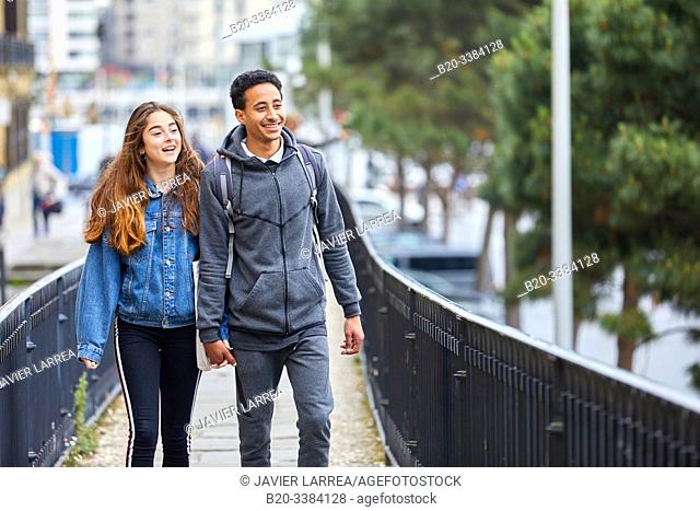 Couple of tourists visiting the city, Multiracial young couple, Donostia, San Sebastian, Gipuzkoa, Basque Country, Spain