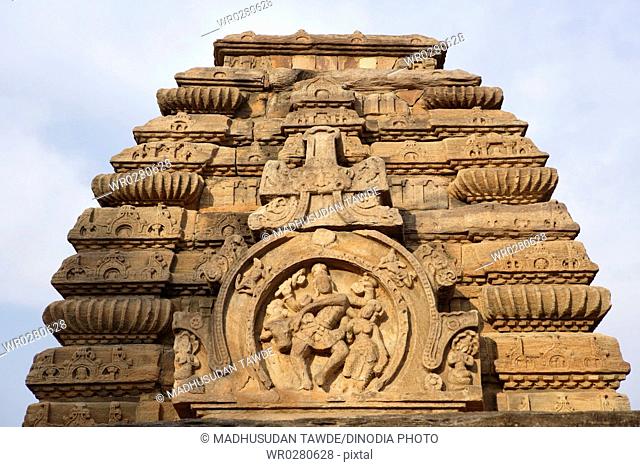 Jambulinga Temple tower curving ribs decorated horseshoe shaped large panel of Shiva dancing with Nandi and Parvati , Pattadakal , Chalukya , District Bagalkot