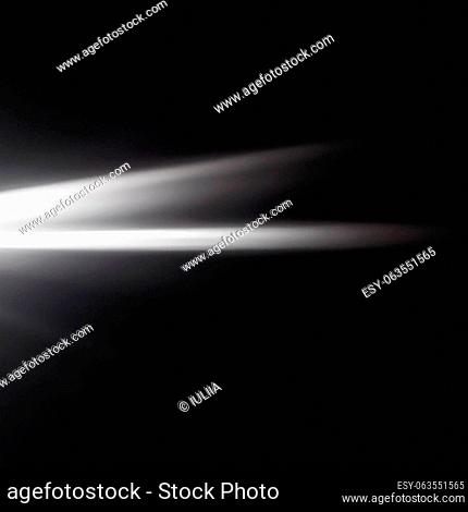 Ray light effects on black background for overlay design. Rays of light fall on empty space. Copy space. White gray beams