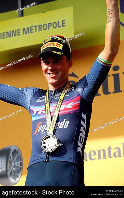 Danish Mads Pedersen of Trek-Segafredo celebrates on the podium after winning stage thirteen of the Tour de France cycling race