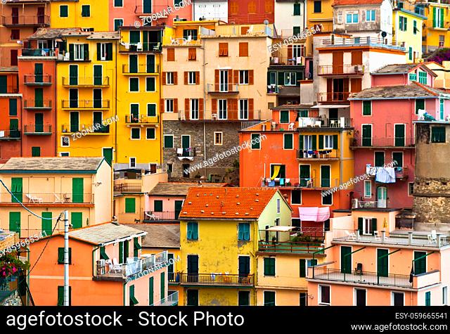 Colourful house frontings forming a beautiful background pattern. Manarola village, Cinque Terre, Italy. Horisontal composition