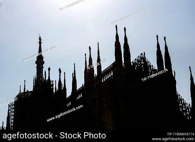 Europe, Italy. Lombardy, Milan. Spiers of the gothic cathedral. On the highest lily there is the statue of the Virgin Mary called Madonnina