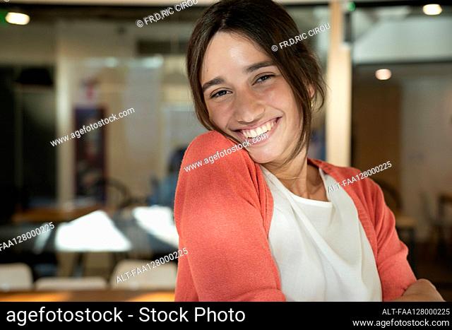Portrait of smiling young woman