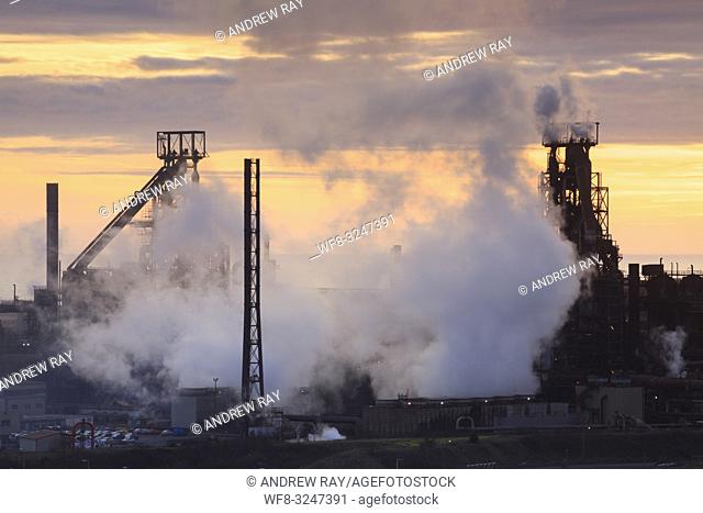 The Tata Steelworks at Port Talbot, in South Wales, captured at sunset from an inland section of the Wales Coast Path on an evening in mid February