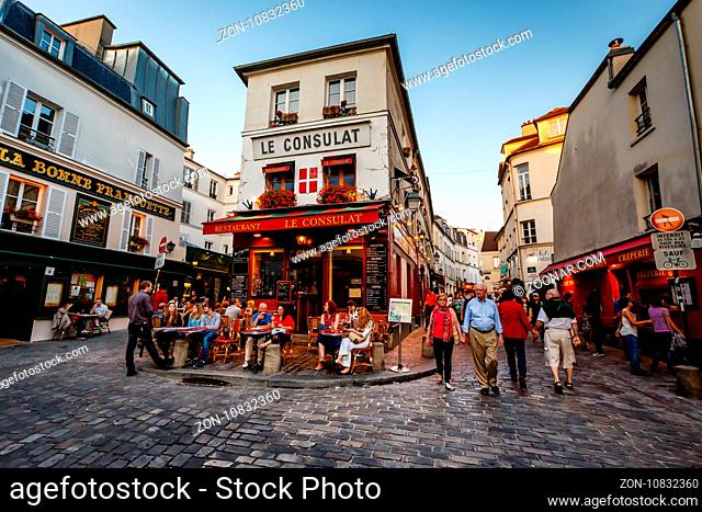 PARIS - July 1: View of typical paris cafe on July 1, 2013 in Paris. Montmartre area is among most popular destinations in Paris, Le Consulat is a typical cafe