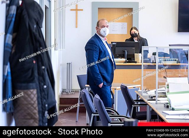 08 April 2021, Bavaria, Regensburg: Christian Schlegl, former candidate for mayor of Regensburg for the CSU, stands in the courtroom at the district court
