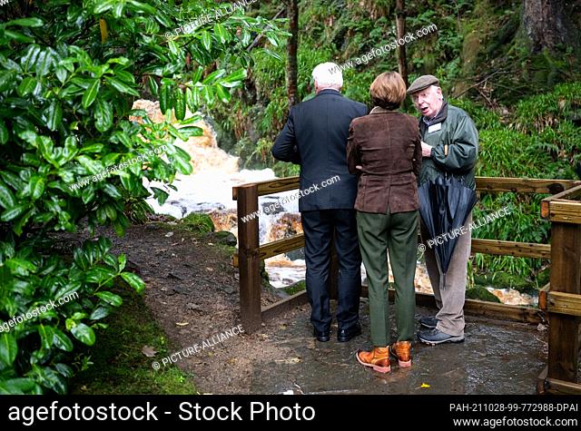 28 October 2021, Ireland, Wicklow: Federal President Frank-Walter Steinmeier and his wife Elke Büdenbender are shown around the German military cemetery in...