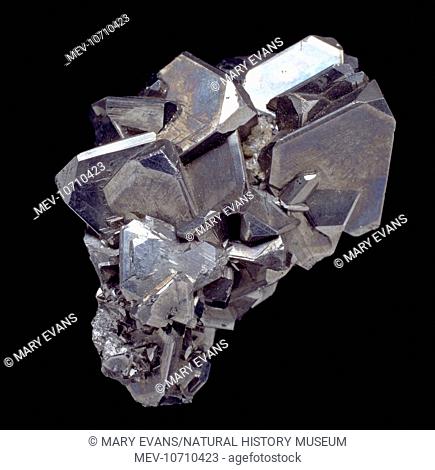 Tetrahedrite comprises of (copper antimony sulphide). This specimen displays flat-faced tetrahedral shaped crystals. Specimen is from the Natural History Museum