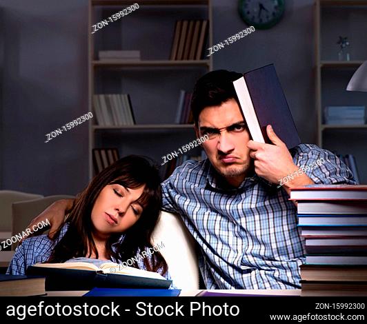 The two students studying late at night