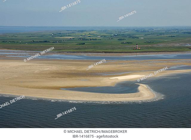 View of the Westerhever lighthouse Westerhever with an offshore barrier beach, sand bank, and the hinterland of the Eiderstedt peninsula, aerial photo