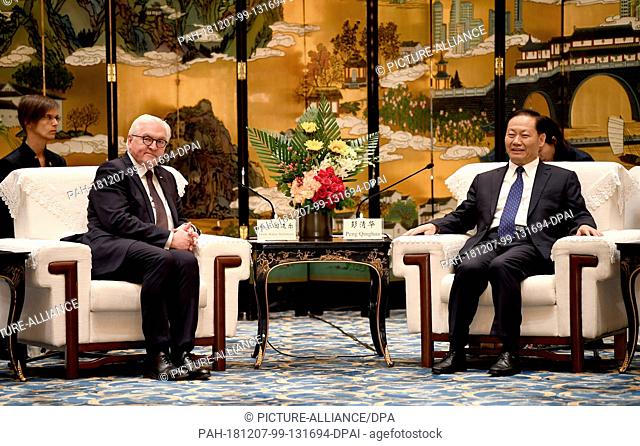 07 December 2018, China, Chengdu: Federal President Frank-Walter Steinmeier (l) meets Peng Qinghua, Party Secretary of Sichuan Province