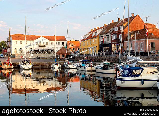 Bornholm, Denmark - August 6, 2020: Sailboats anchored at the small harbor in Allinge