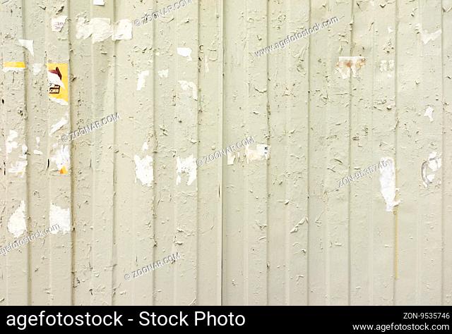 Old Painted Wall With Aged Torn Posters Background Texture With Copy Space