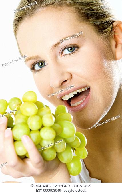 portrait of woman with grape