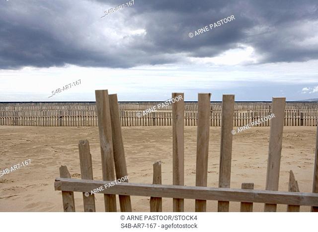Windbreak fences at sandy beach, Tarifa, Andalusia, Spain