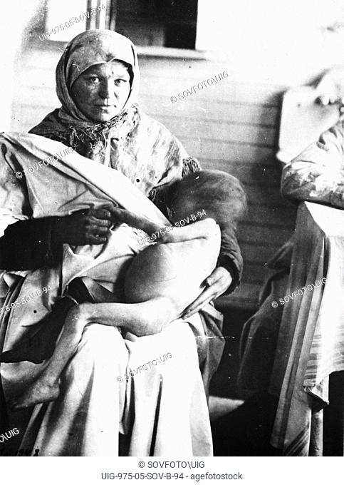 Famine, soviet union, a child dying of hunger, volga region, 1921-22