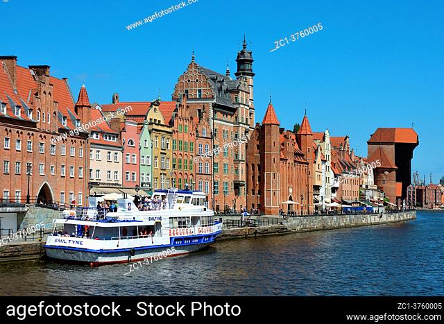 Cityscape of Gdansk at the river Motlawa with Crane gate and Passenger liner - Poland