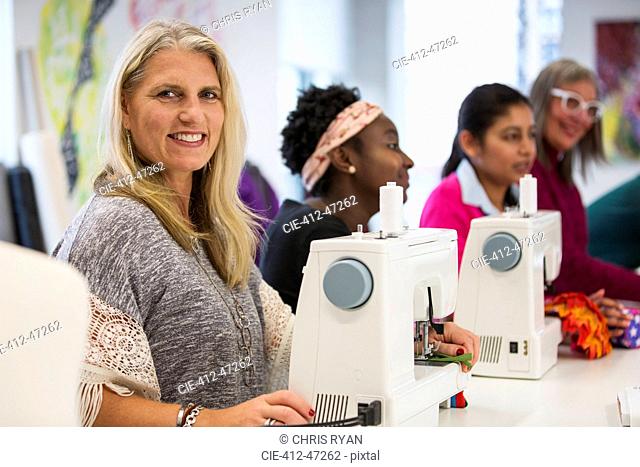 Portrait confident woman taking sewing class