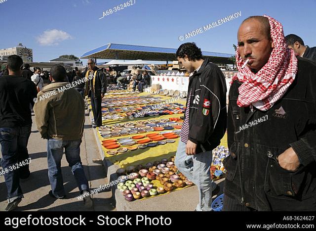Even tourist can find something to buy at the market place in Sousse. Photo: André Maslennikov