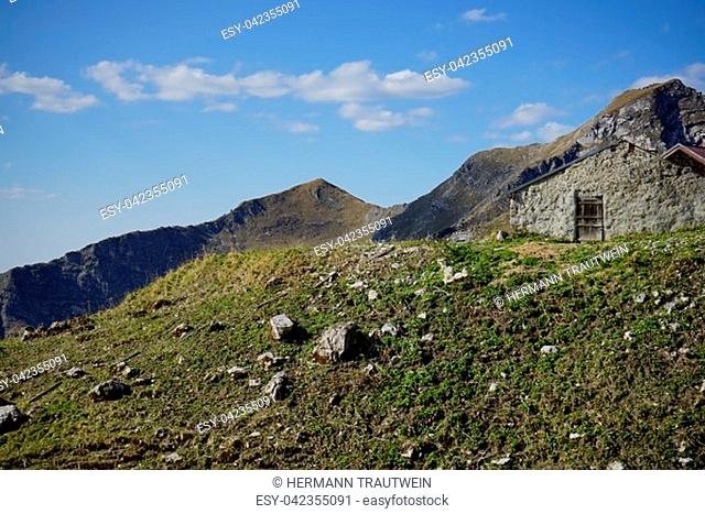 Mountain hut made of rock and stone in the high mountains on the Nebelhorn near Oberstdorf in the Allgäu