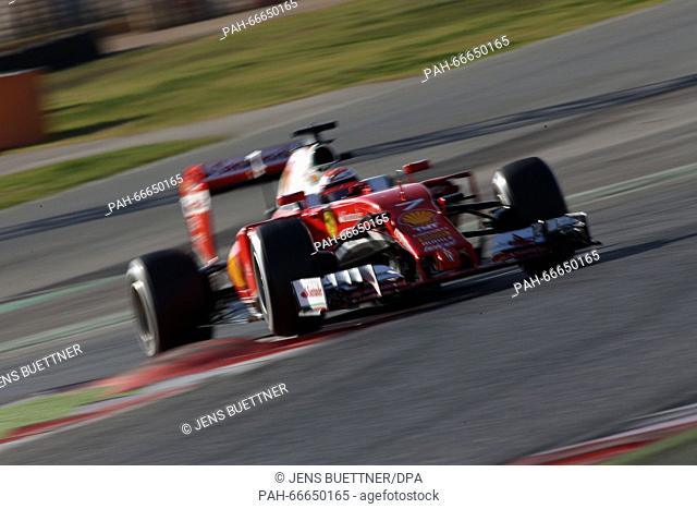 Finnish Formula One driver Kimi Raikkonnen of Ferrari steers his car during the training session for the upcoming Formula One season at the Circuit de Barcelona...
