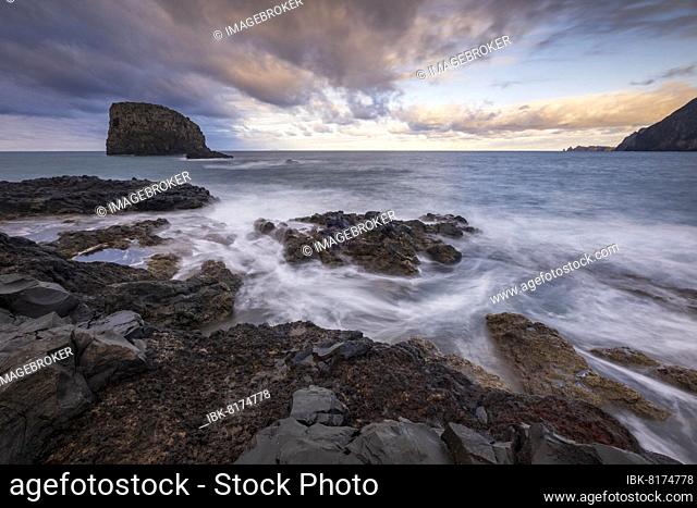 Rock coast, volcanic rock formations, sunset, coast near Porto da Cruz, Madeira, Portugal, Europe