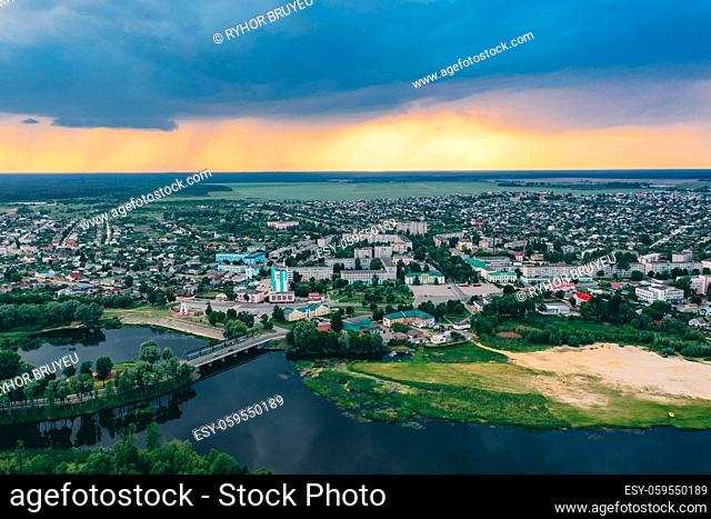 Dobrush, Gomel Region, Belarus. Aerial View Of Dobrush Cityscape Skyline In Spring Sunset Sunrise Time. Residential District And River In Bird's-eye View