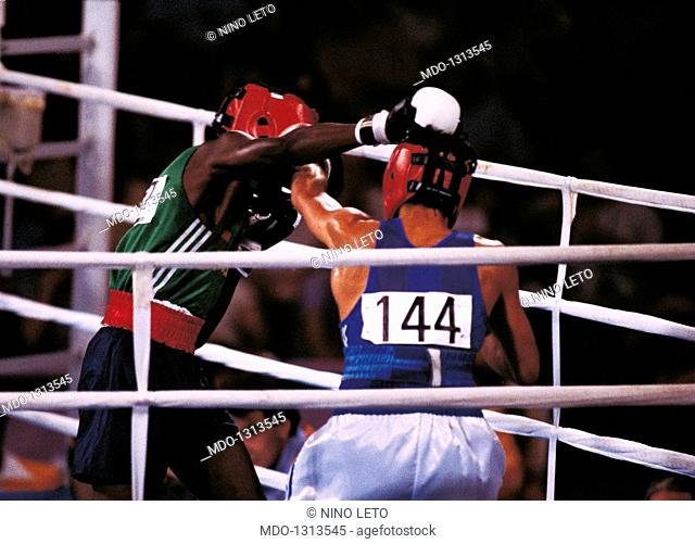 Maurizio Stecca on the ring. The Italian boxer Maurizio Stecca fighting on the ring in the bantamweight division at Los Angeles Olympics