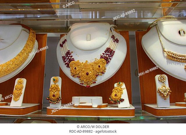 Gold jewelry in shop window, gold bazaar, Sikkat al-Khail Road-, Bur Deira, Dubai, United Arab Emirates