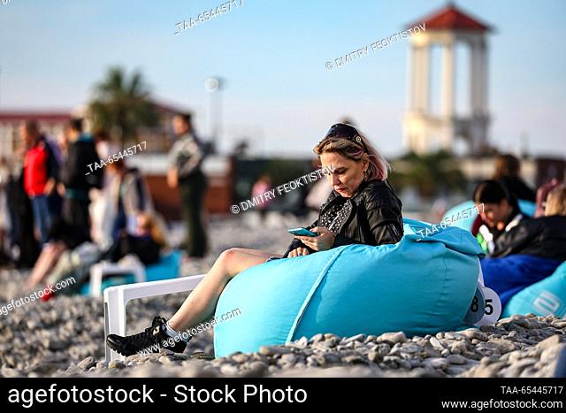 RUSSIA, SOCHI - DECEMBER 3, 2023: A woman is seen on the Mayak beach by the Black Sea. According to the website of the Sochi administration