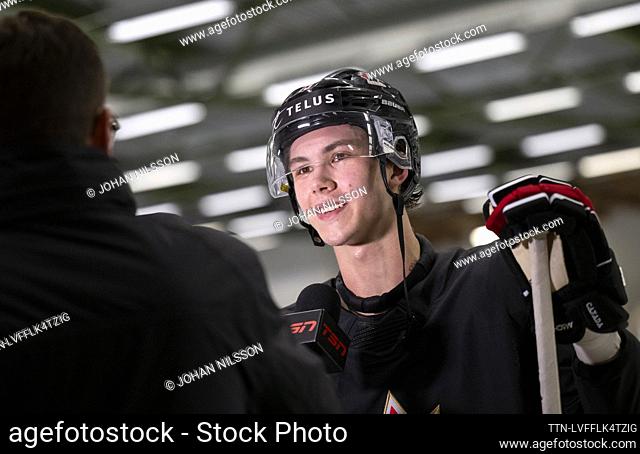 Maveric Lamoureux (13) is interviewed when Canada's team trains in Limhamns Ice Hall in Malmö, Sweden, 18 December 2023 ahead of the JVM (2024 IIHF Junior WC)