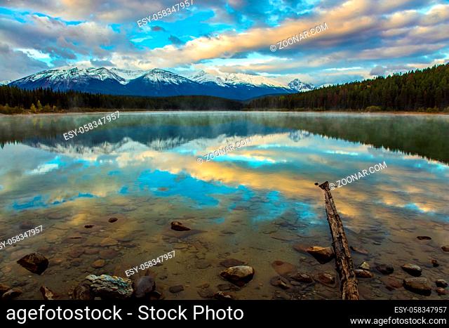 Majestic and magnificent lake Patricia at sunsise. Picturesque shallow lake in Jasper National Park. Rocky Mountains of Canada