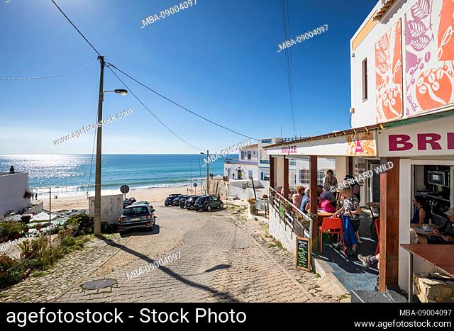Bar on the beach of the village of Burgau, located in the natural park Parque Natural do Sudoeste Alentejano and Costa Vicentina, Algarve, Faro, Portugal