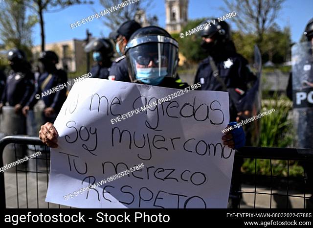 TOLUCA, MEXICO - MARCH 8, 2022: riot police during a demonstration of women that protest against gender violence to commemorate International Women's Day