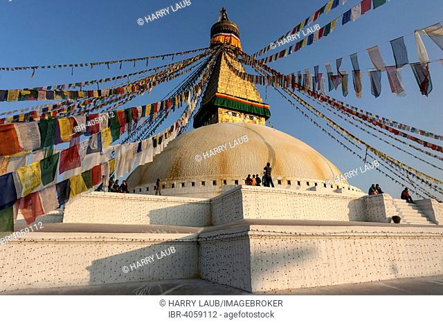 Boudhanath Stupa, adorned with prayer flags, evening light, Boudhanath, UNESC World Heritage Site, Kathmandu, Nepal