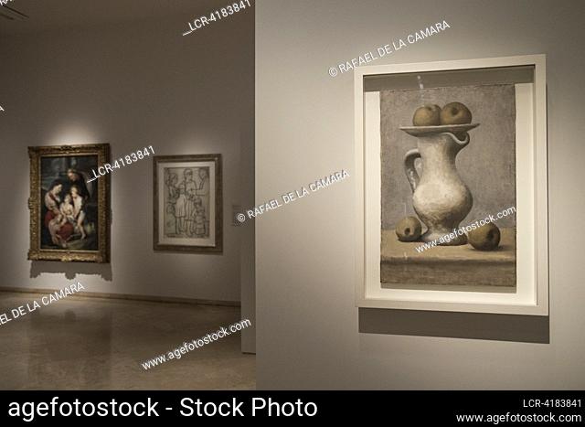 (NO SALE OR LICENSE FOR MUSEUMS AND PUBLIC EXHIBITIONS) PICASSO EXHIBITION THE SACRED AND THE PROFANE.IN FOREGROUND STILL LIFE WITH JUG AND APPLES WINTER