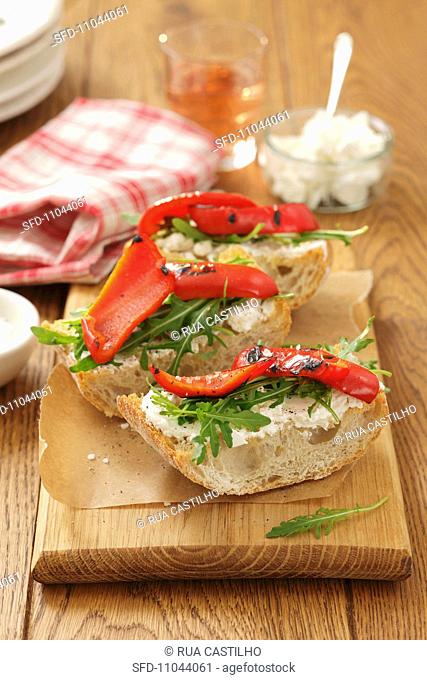 Ciabatta topped with goat's cheese and grilled peppers