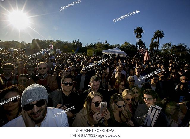 Protesters attend the United Talent Agency's United Voices Rally against Donald Trump's politics at UTA Plaza in Beverly Hills, Los Angeles USA