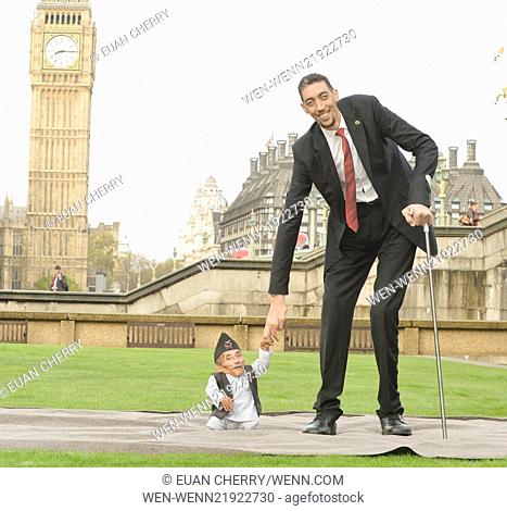The shortest man ever Chandra Bahadur Dangi 54.6com - 21.5 inches) and the tallest living man Sultan Kosen 251cm - 8ft 3 inches) meet for the first time in...