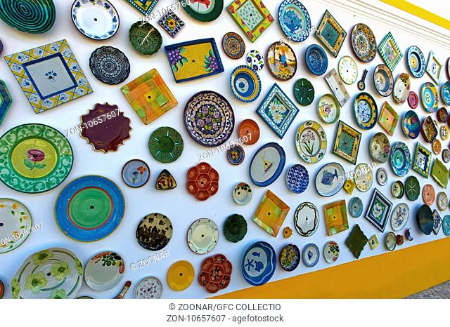 Portuguese pottery at the wall of the pottery shop Artesanato A Mo, Sagres, Algarve, Portugal