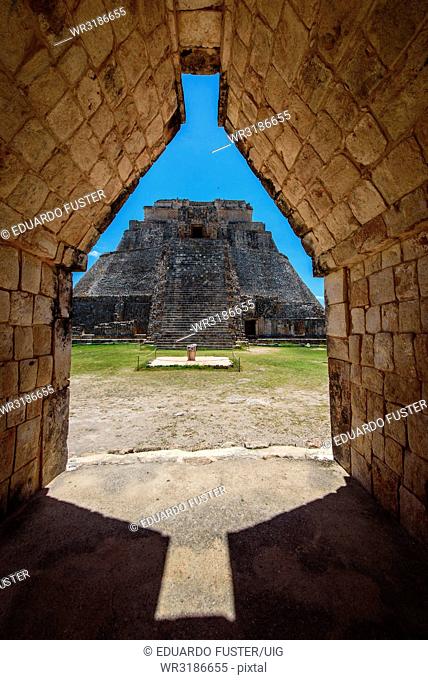 View to the Pyramid of the Magician in prehispanic Mayan city of Uxmal Archaeological Site, Yucatan Province, Mexico, North America