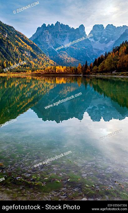 Autumn peaceful alpine lake Durrensee or Lago di Landro. Snow-capped Cristallo rocky mountain group behind, Dolomites, Italy, Europe
