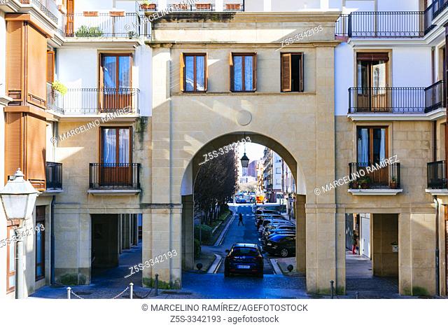 Building with arch that connects two streets, Pilar street and, Juncal street. Irun, Gipuzkoa, Donostialdea, Basque Country, Spain, Europe
