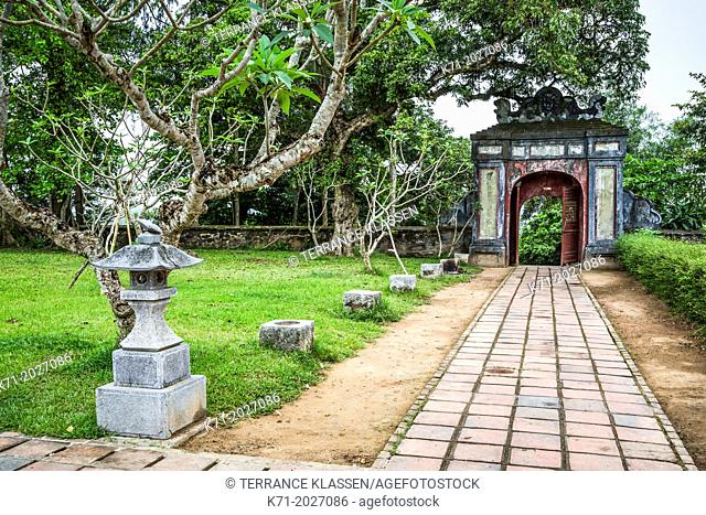 A rustic old gate at the Thien Mu Pagoda near Hue, Vietnam, Asia