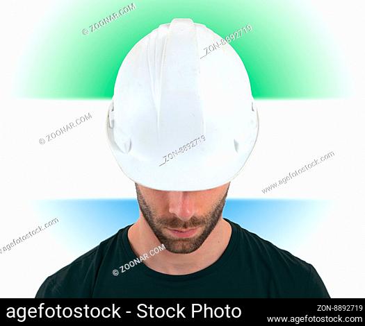 Isolated engineer with flag on background - Sierra Leone