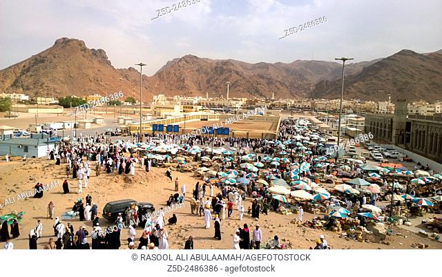 picture of some people who are above the mountain Uhud, It is a mountain that has happened Uhud battle at the beginning of the deployment of the Islamic...
