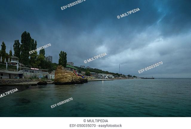 Odessa, Ukraine - 09.09.2018. Otrada beach in Odessa, Ukraine, in a gloomy summer morning. Dark clouds asperatus over the sea until dawn
