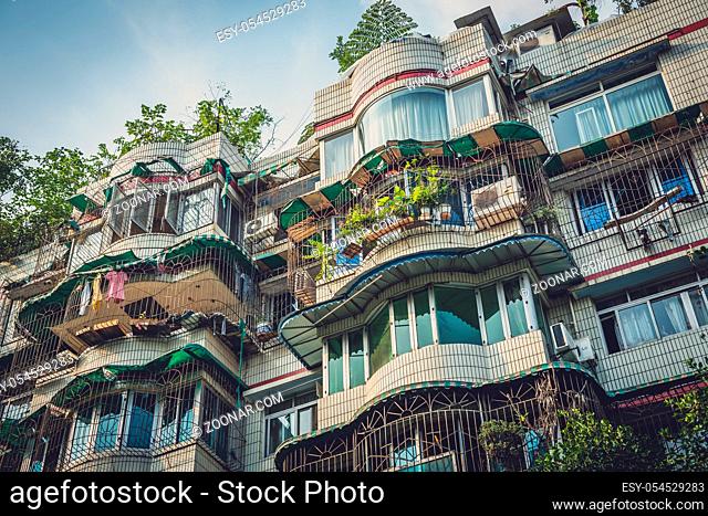 Windows and balconies of old residential buildings and blocks of flats in Chengdu, China