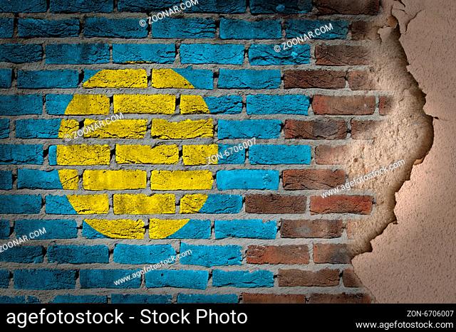 Dark brick wall texture with plaster - flag painted on wall - Palau