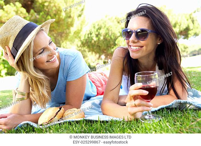 Two Female Friends Enjoying Picnic Together